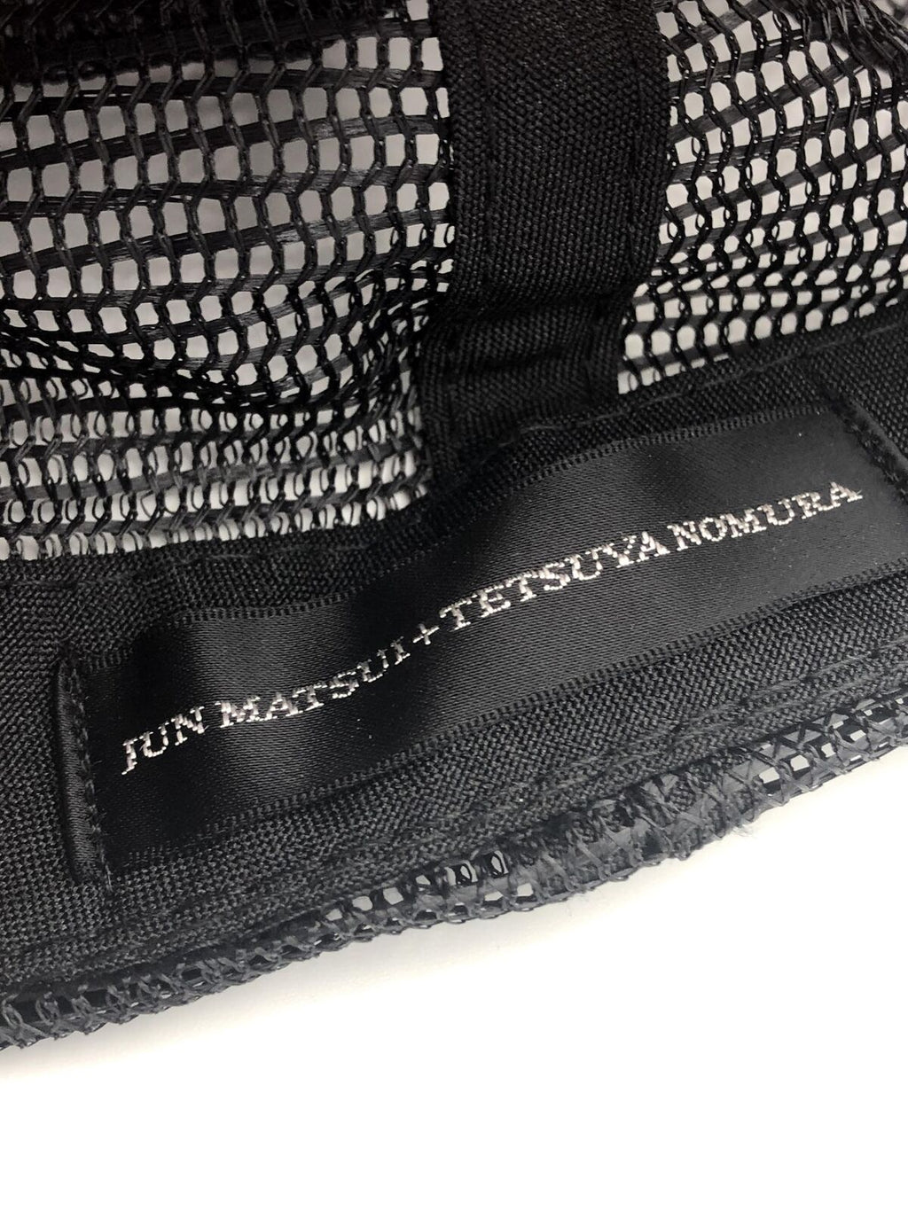 Final Fantasy VII Advent Children mesh trucker cap designed by Tetsuya Nomura