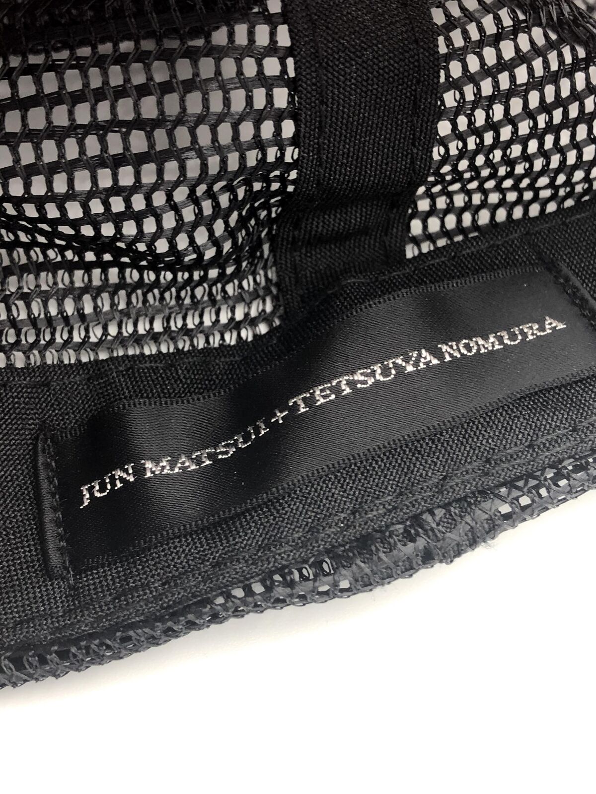 Final Fantasy VII Advent Children mesh trucker cap designed by Tetsuya Nomura