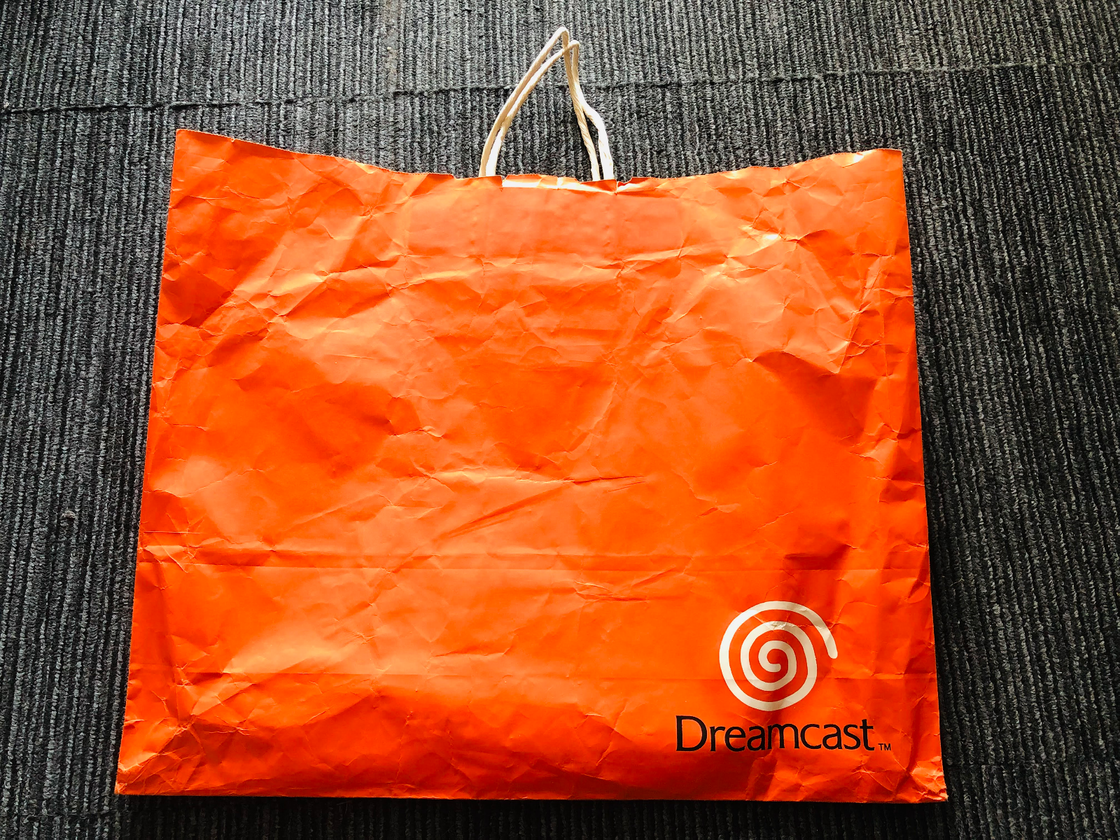 Sega Dreamcast orange shopping bag 1998 launch promotional paper promo logo