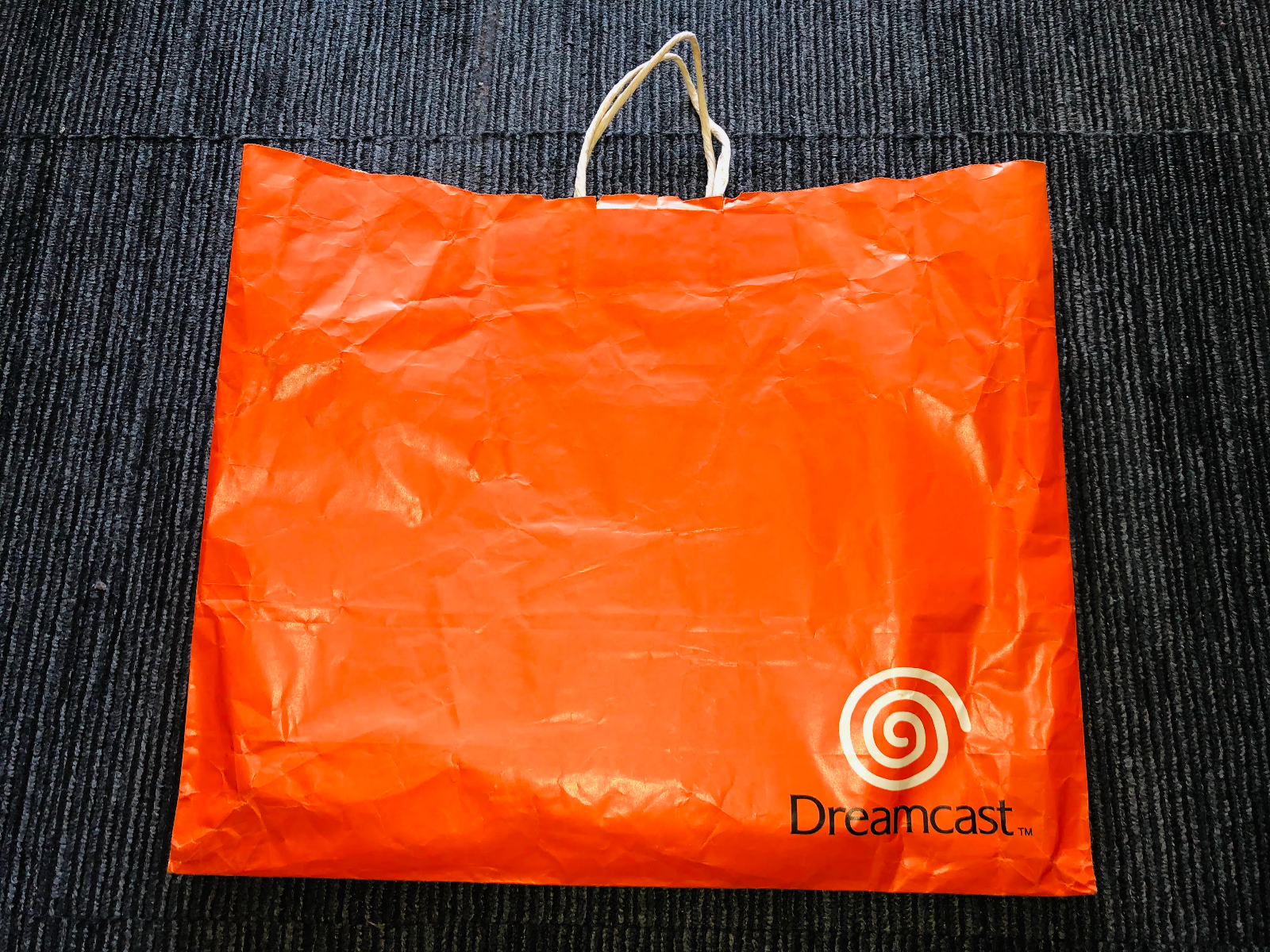 Sega Dreamcast orange shopping bag 1998 launch promotional paper promo logo