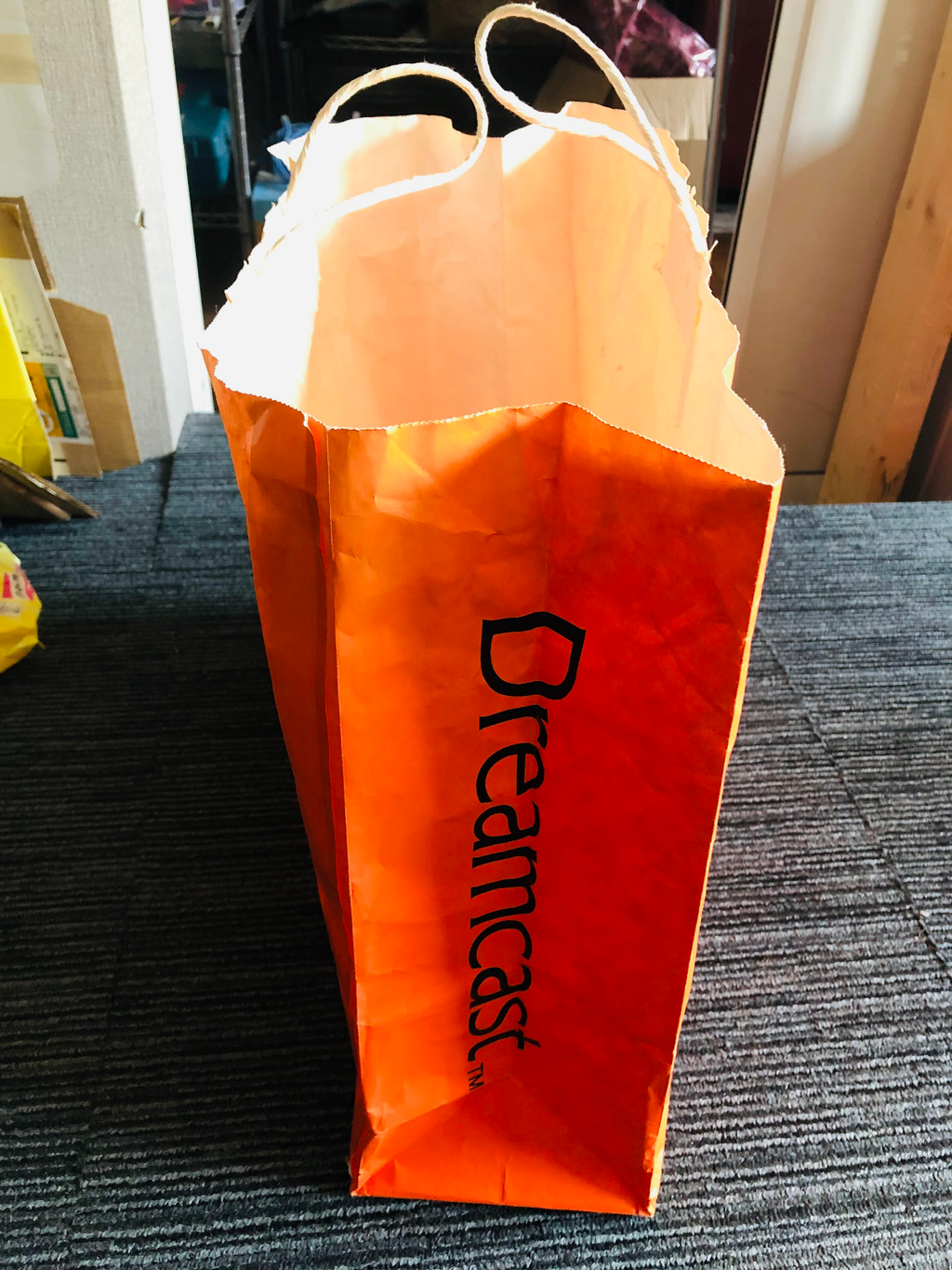 Sega Dreamcast orange shopping bag 1998 launch promotional paper promo logo