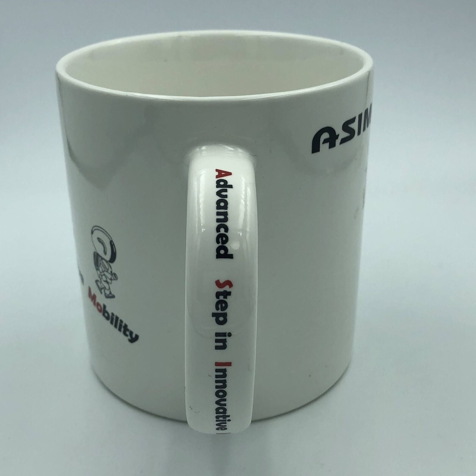 Honda Asimo promo coffee mug cute humanoid robot 2000s advertising Japan 2000